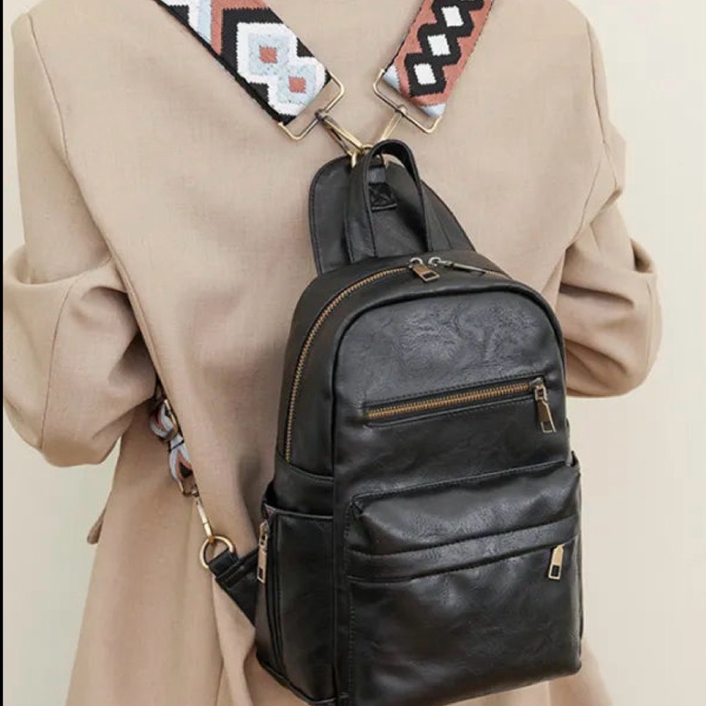 Black Leather Backpack with Patterned Strap
